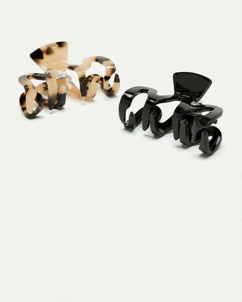 Swirl Hair Clips - Set of 2 sold by Reitmans