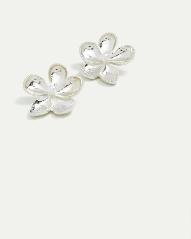 Flower Earrings sold by Reitmans