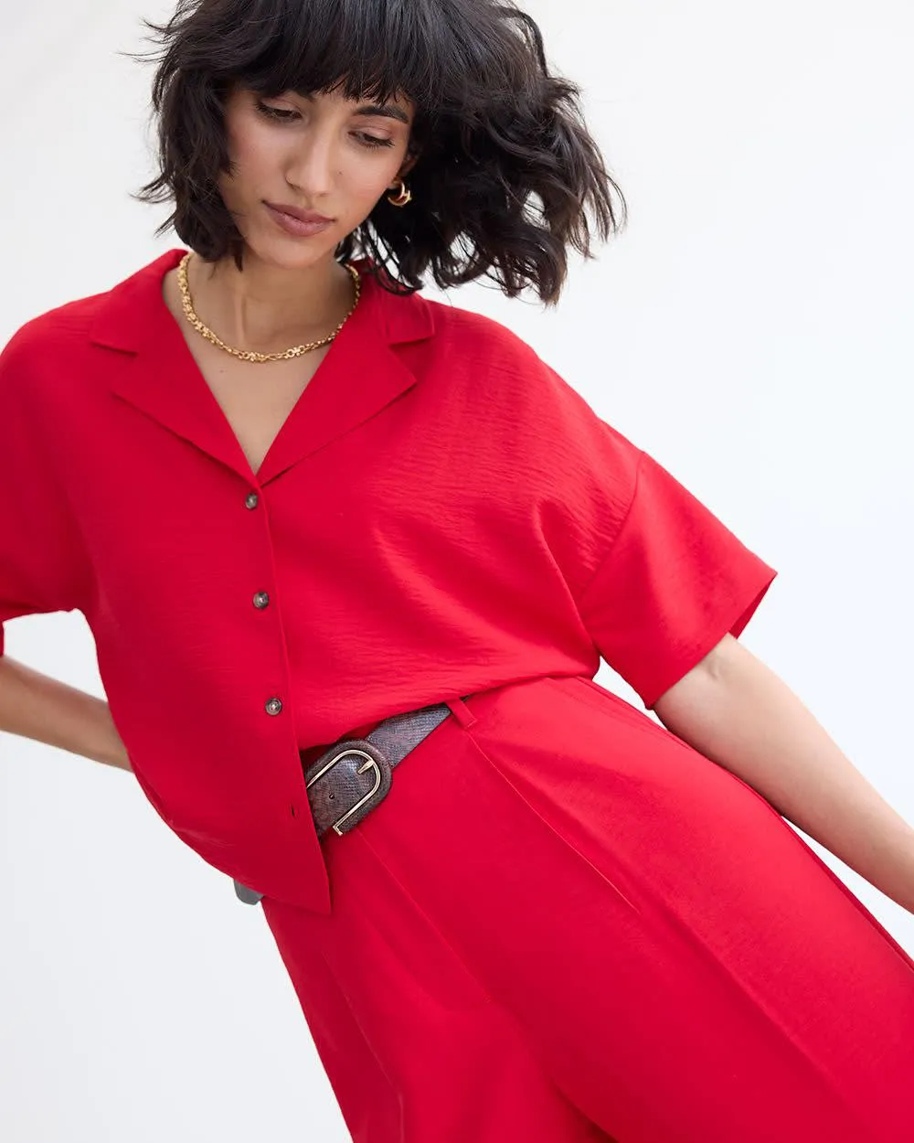 Short-Sleeve Buttoned-Down Blouse sold by Reitmans