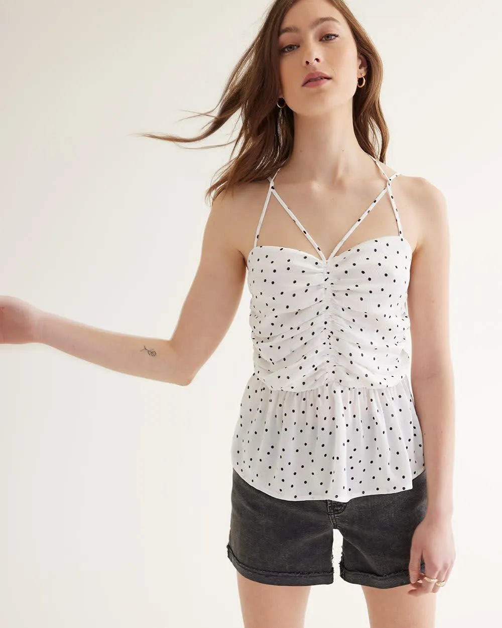 Sleeveless Peplum Top with Sweetheart Neckline sold by Reitmans
