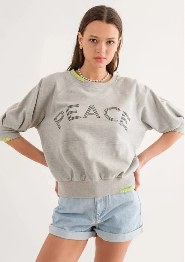 Evercado - Peace Sweatshirt sold by Reitmans