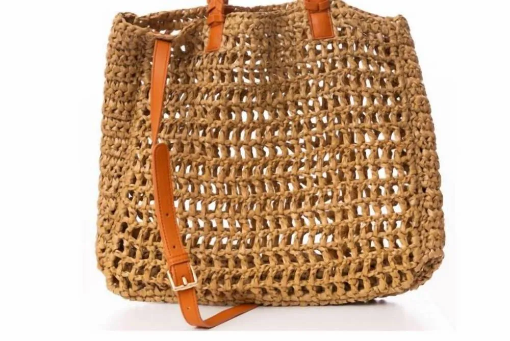 JULES KAE - The Charlotte Straw Bag sold by Reitmans
