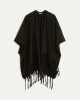 Poncho with Fringes sold by Reitmans