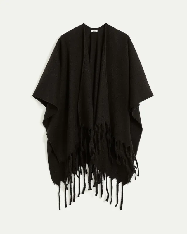 Poncho with Fringes sold by Reitmans