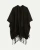 Poncho with Fringes sold by Reitmans