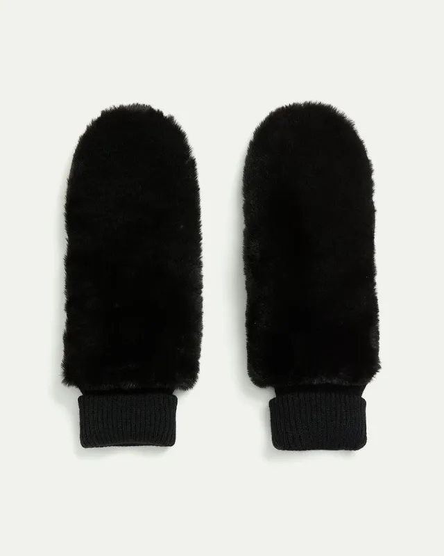 Leather and Faux Fur Mitts sold by Reitmans