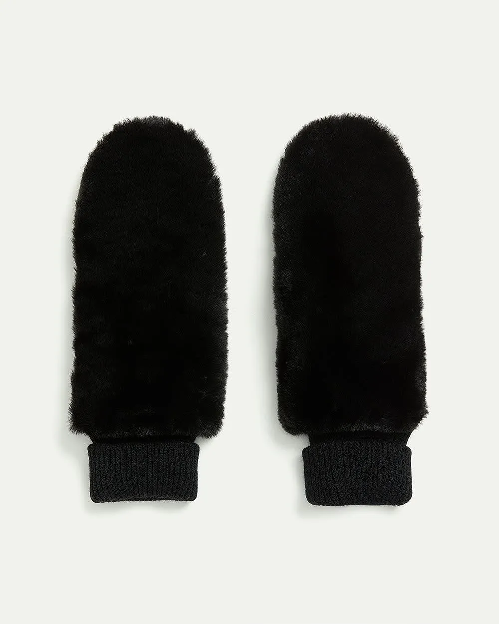 Leather and Faux Fur Mitts sold by Reitmans
