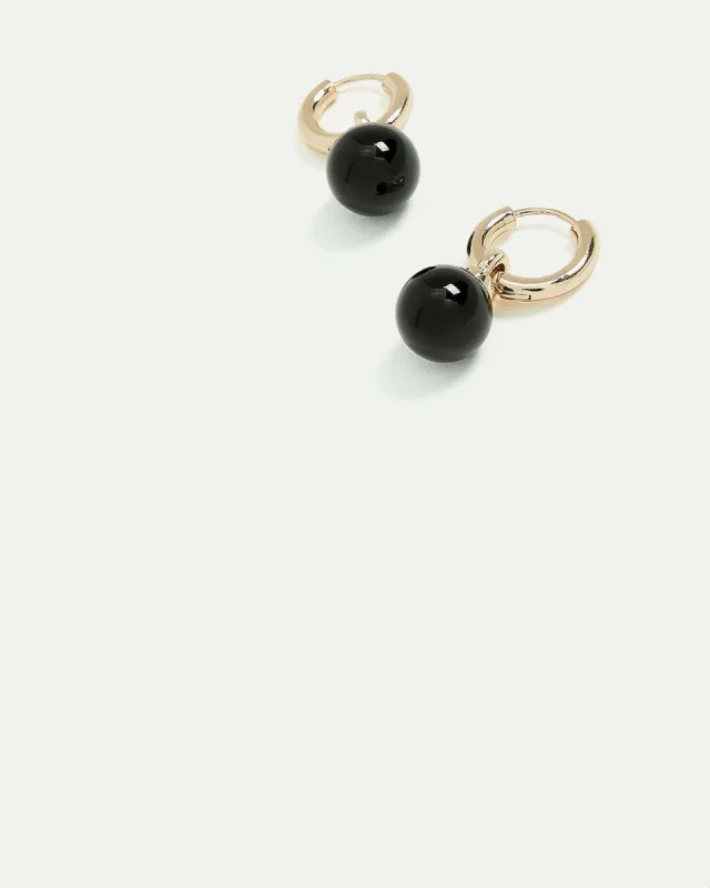 Small Hoops with Ball Pendants sold by Reitmans