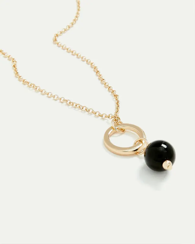 Long Necklace with Pearl Pendant sold by Reitmans