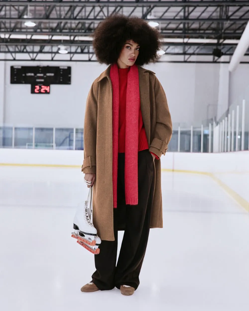 Long Belted Coat sold by Reitmans