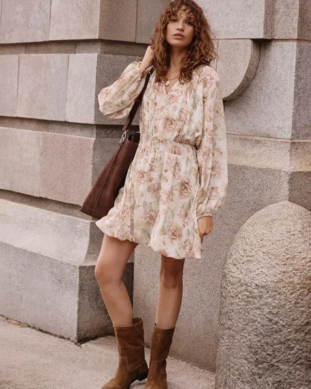 Long-Puffy-Sleeve Bubble Mini Dress with V Neckline sold by Reitmans