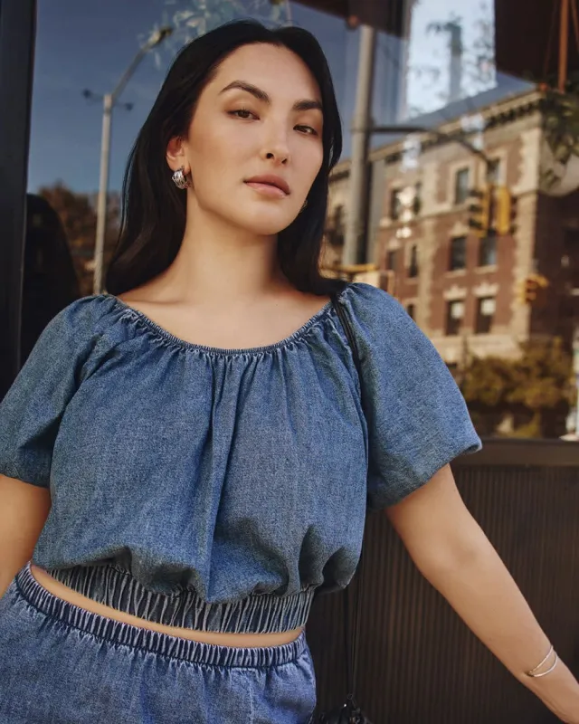 Short-Puffy-Sleeve Denim Top with Boat Neckline sold by Reitmans