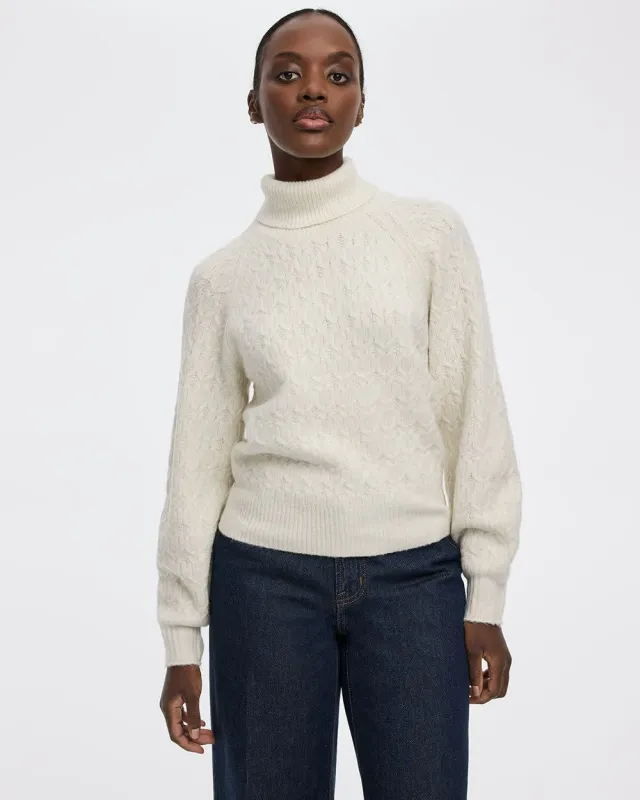 Long-Balloon-Sleeve Mock-Neck Sweater sold by Reitmans
