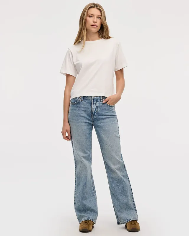 Flare-Leg Mid-Rise Jean sold by Reitmans