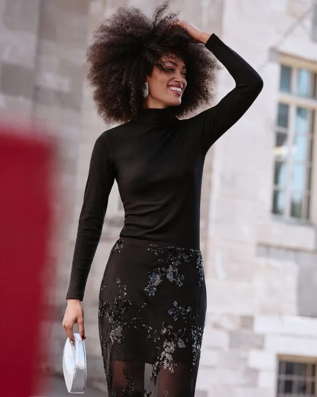 Long-Sleeve Turtleneck Top sold by Reitmans