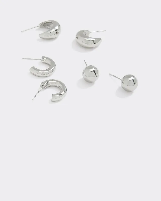 Stainless Steel Hoops and Stud Earrings - 3 Pairs sold by Reitmans