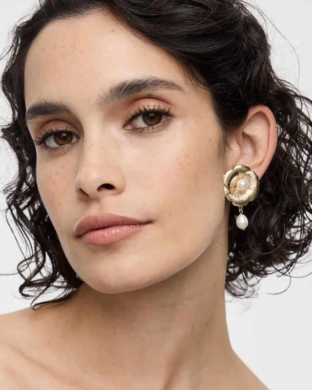 Flower Earrings with Pearl Pendant sold by Reitmans