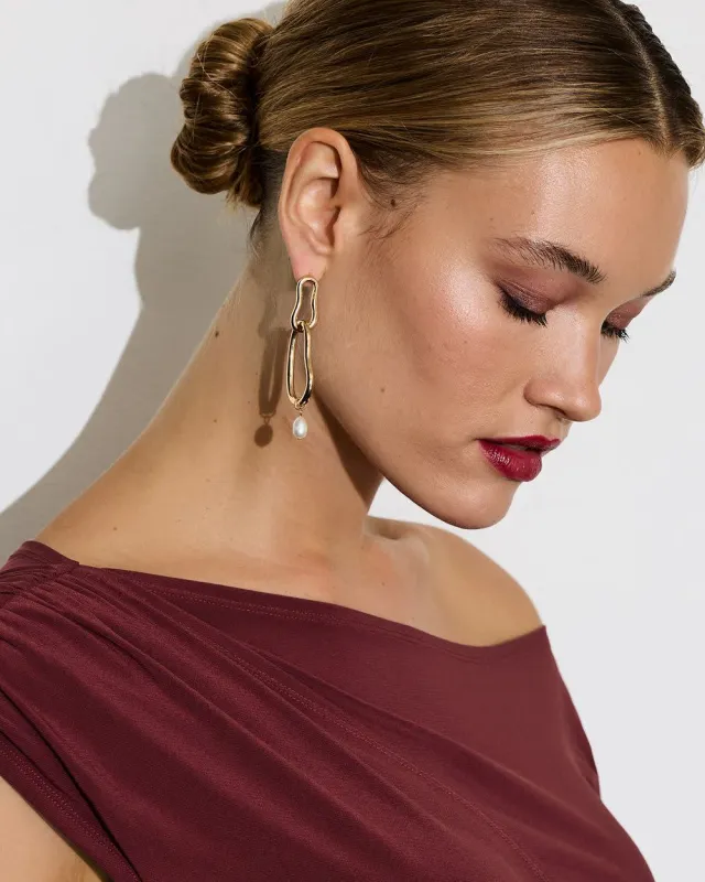 Link Earrings with Pearl Pendants sold by Reitmans