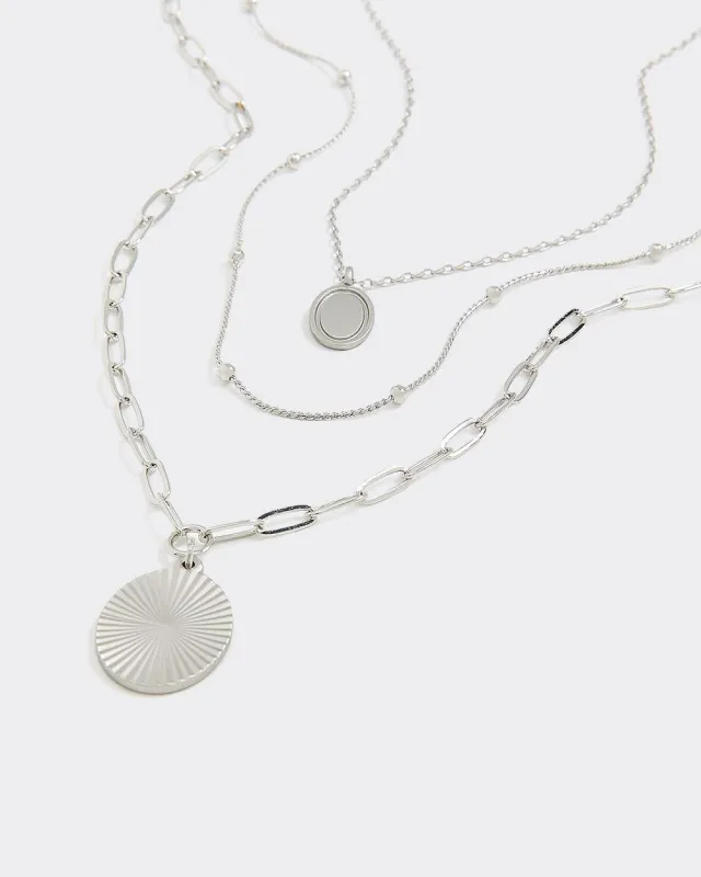 Multi-Chain Necklace with Round Pendants sold by Reitmans