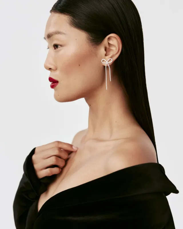 Rhinestone Bow Earrings sold by Reitmans