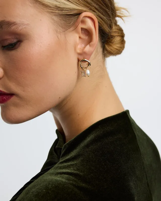 Hoop Studs with Pearl and Rhinestone Pendants sold by Reitmans