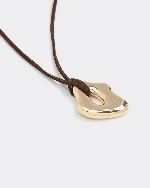 Metal Pendant on Short Cord Necklace sold by Reitmans