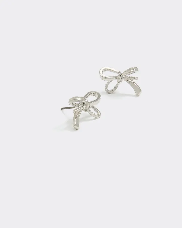 Small Delicate Bow Earrings sold by Reitmans