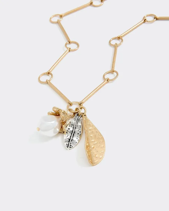 Y Necklace with Charms sold by Reitmans