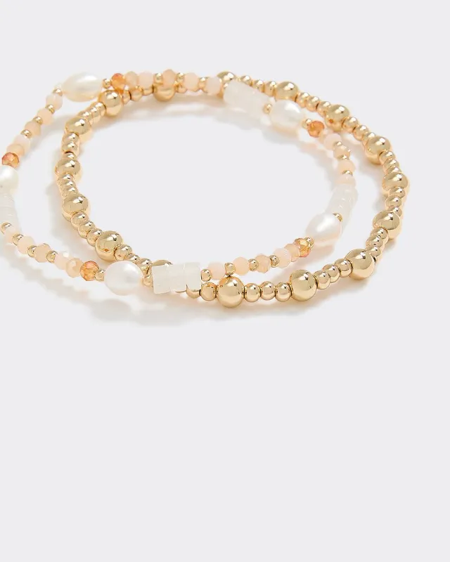 Beaded Elastic Bracelets - Set of 2 sold by Reitmans