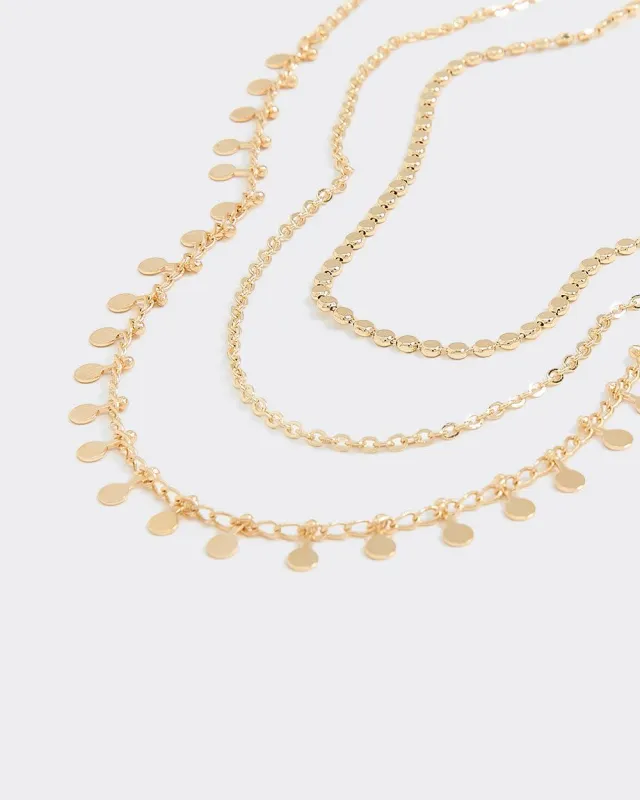 Triple-Chain Short Necklace with Coin Pendants sold by Reitmans