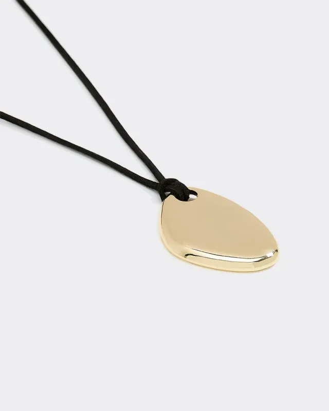 Long Cord Necklace with Organic Pendant sold by Reitmans