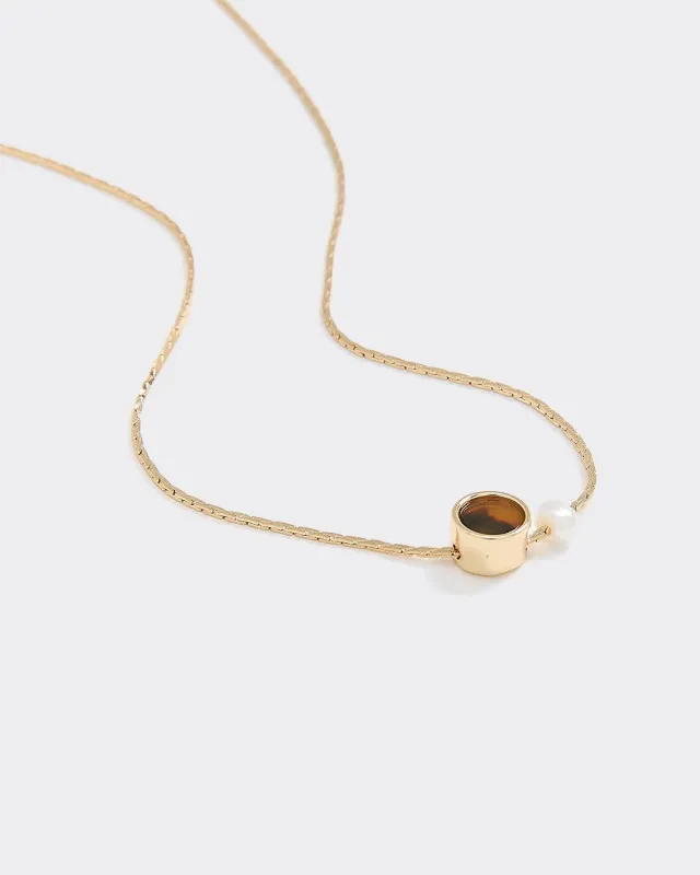 Delicate Necklace with Stone and Pearl sold by Reitmans