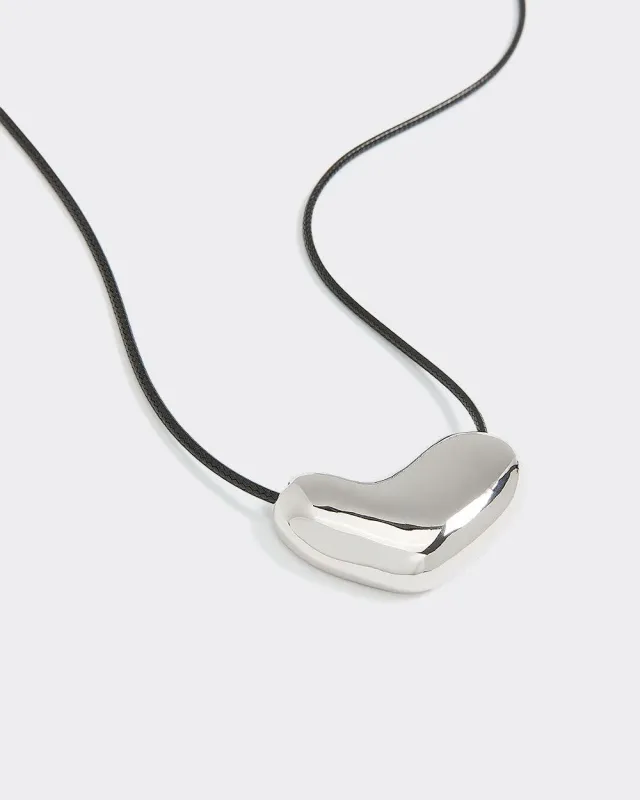 Pendant on Long Cord Necklace sold by Reitmans