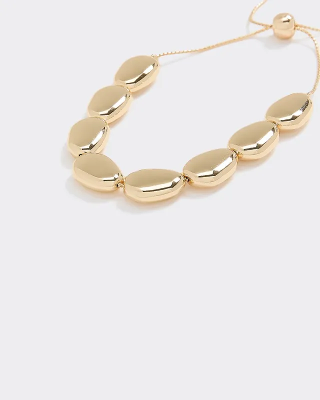 Delicate Chain Bracelet with Pebbled Beads sold by Reitmans