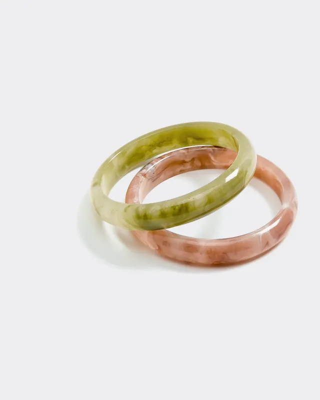 Resin Cuff Bracelets - Set of 2 sold by Reitmans