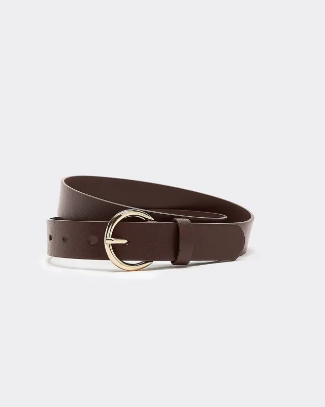 Faux Leather Belt with Round Buckle sold by Reitmans