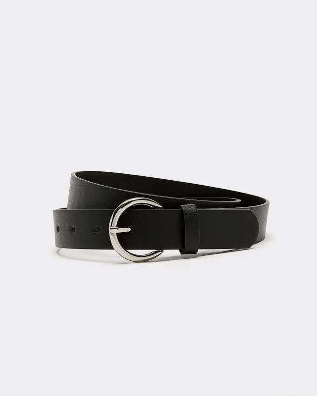 Faux Leather Belt with Round Buckle sold by Reitmans