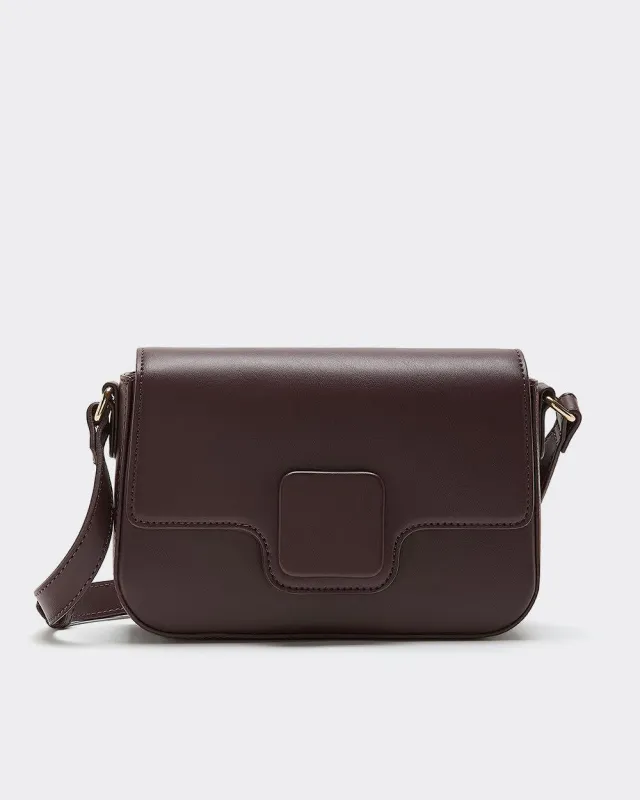 Faux Leather Crossbody Bag sold by Reitmans