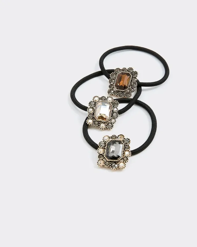 Hair Ties with Tiny Brooch sold by Reitmans