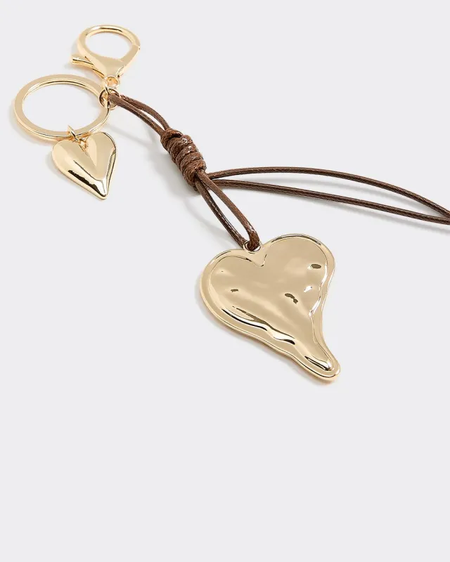 Cord Bag Charm with Metal Heart sold by Reitmans