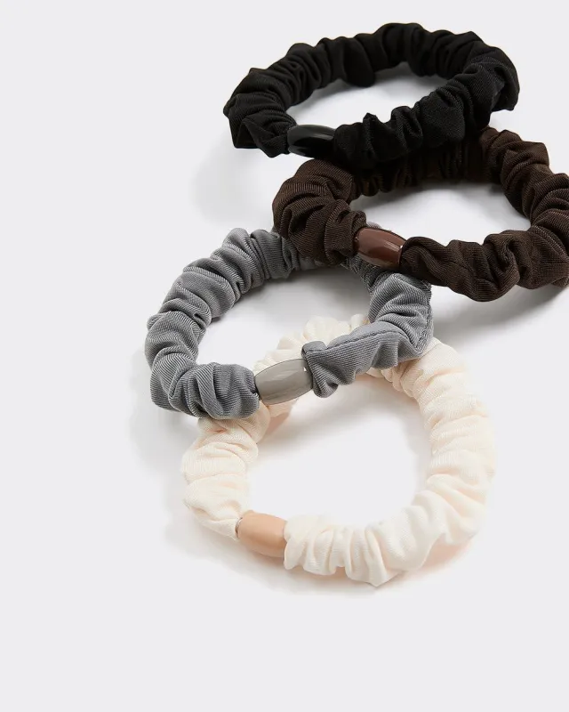 Solid Scrunchies - Set of 4 sold by Reitmans