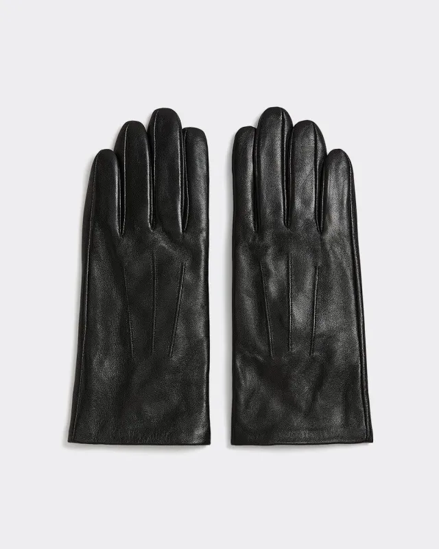 Tech-Friendly Leather Gloves sold by Reitmans