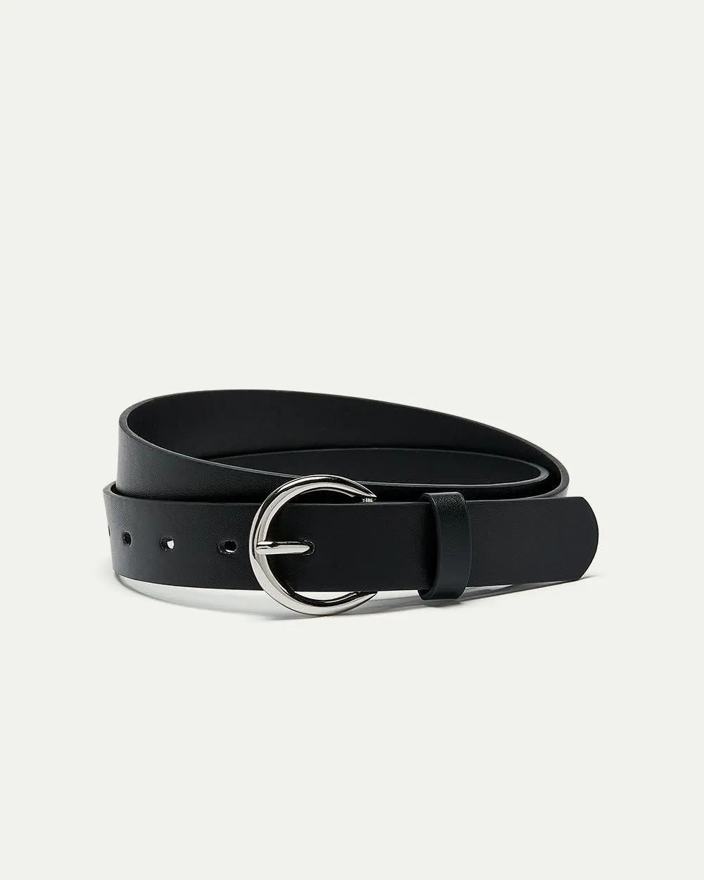 Faux Leather Belt with Round Buckle sold by Reitmans