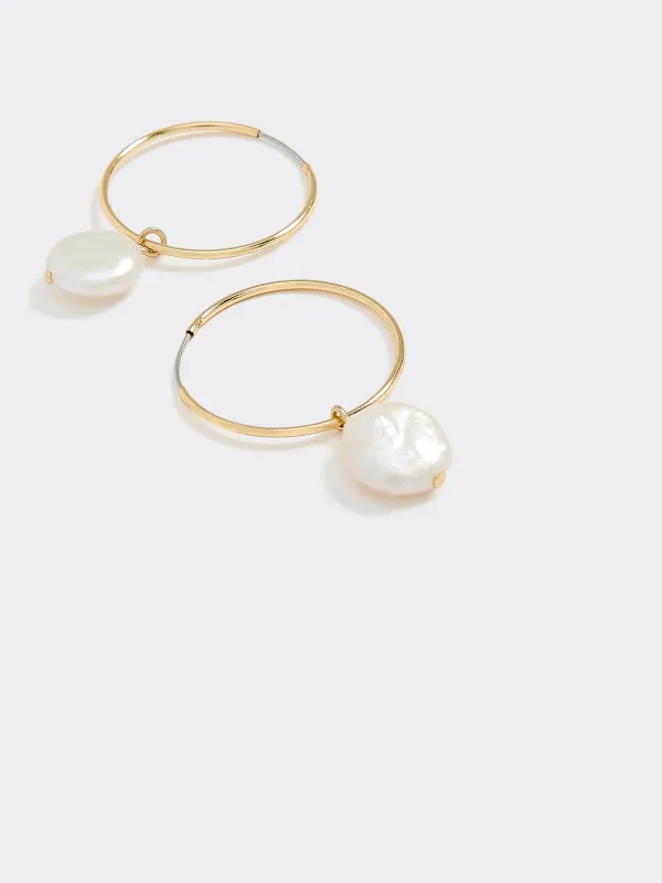 Thin Endless Hoops with Pearls sold by Reitmans