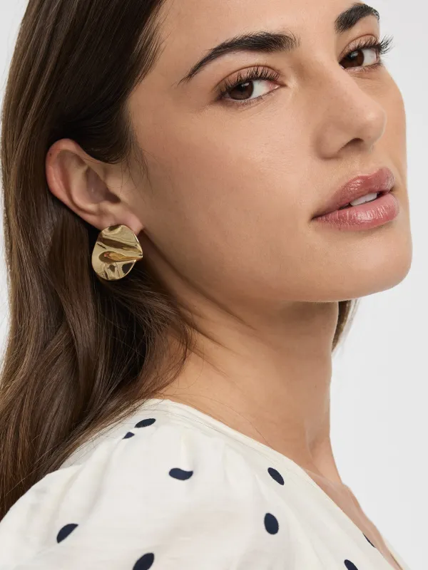 Circular Earrings sold by Reitmans
