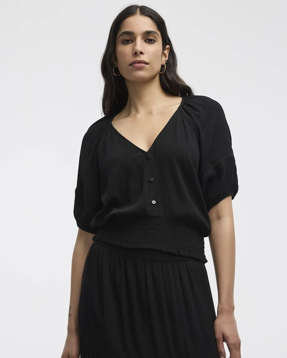 Short-Puffy-Sleeve Top with V Neckline sold by Reitmans