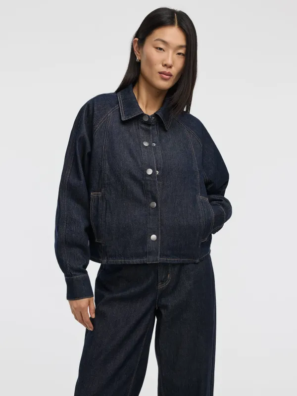 Denim Shacket sold by Reitmans