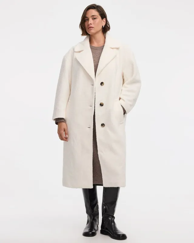 Oversized Sherpa Coat sold by Reitmans