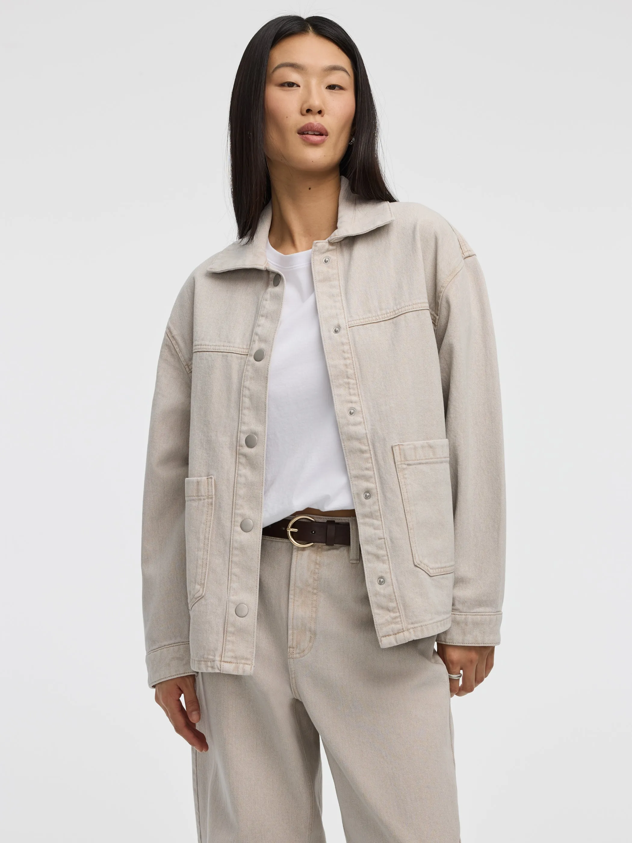 Denim Shacket sold by Reitmans