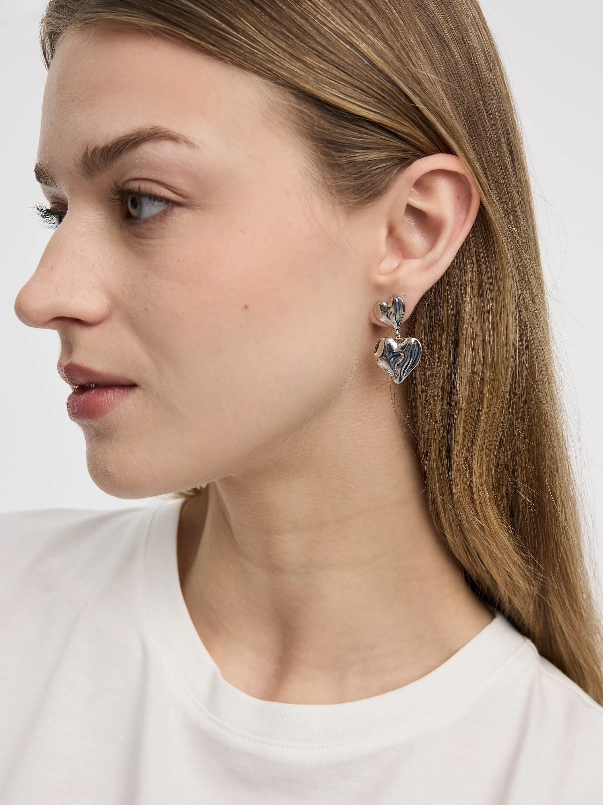 Double Heart Earrings sold by Reitmans